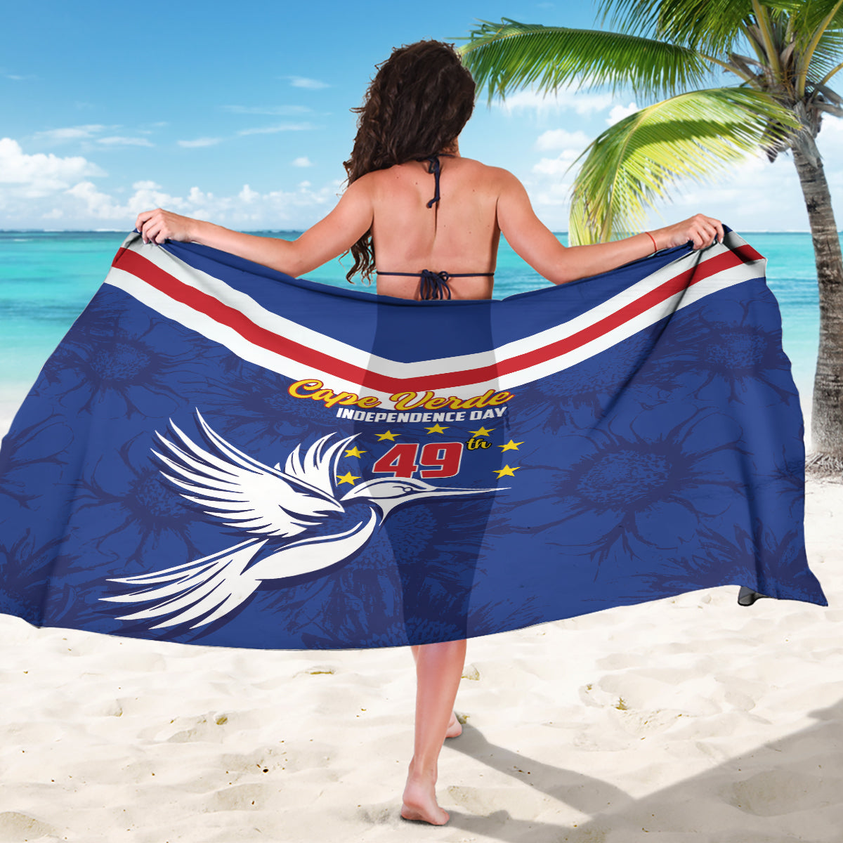 Blue Cape Verde-themed sarong held open, featuring flag stripes, bird graphic, and 49 stars.