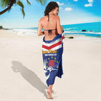 Blue Cape Verde-themed sarong with flag stripes and Independence Day text and emblem.