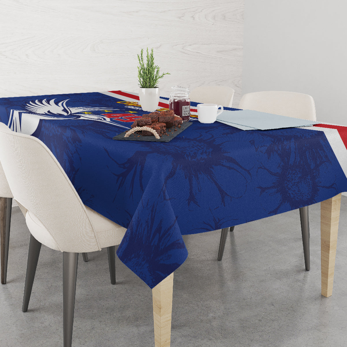 Blue tablecloth with red-white stripe border and white dove wings pattern