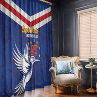 Blue curtain panel with Cape Verde Independence Day emblem and bird silhouette graphic