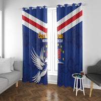 Blue window curtain panels with Cape Verde Independence Day text and bird emblem