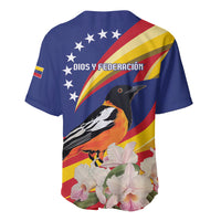 Blue baseball jersey with Venezuela flag, troupial bird, and orchids