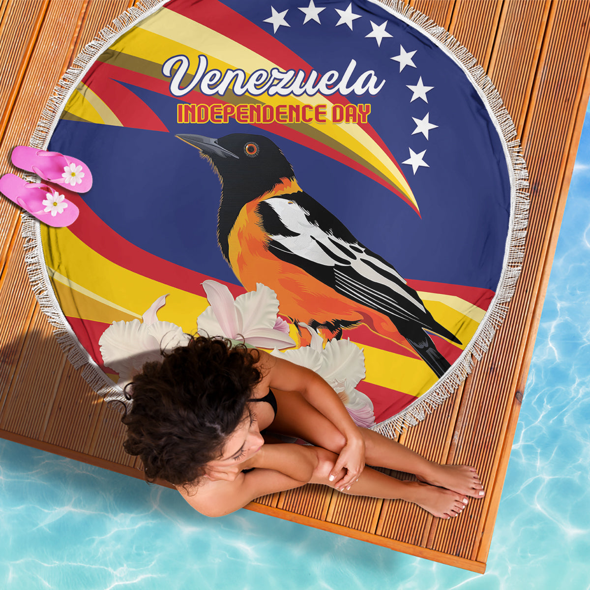 Round beach blanket with Venezuela Independence Day text, toucan and white flower print