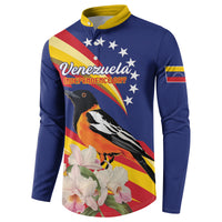 Blue button sweatshirt with yellow collar; angled front print of "Venezuela Independence Day" with bird