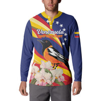 Blue button sweatshirt with yellow button placket; front shows "Venezuela Independence Day" bird and flowers