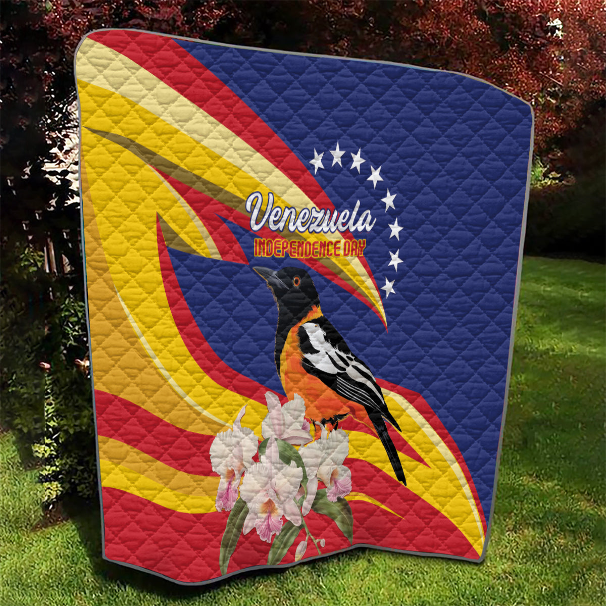 Venezuela Independence Day quilt outdoors, Venezuela flag design with bird and white flowers