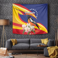 Venezuela flag tapestry hanging on a wall, featuring a bird, white flowers, and star accents