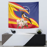 Venezuela flag tapestry with a bird, white orchids, and star details on blue background