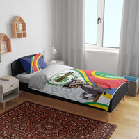 Comoros duvet and two pillow shams with lemur artwork and multi-color flag pattern