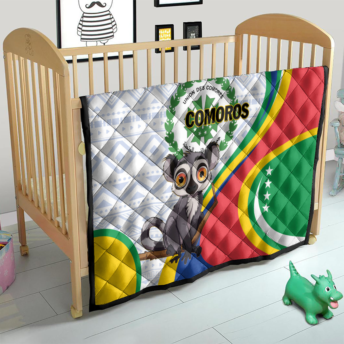 Comoros flag quilt on a child bed with cartoon lemur and curved colorful stripe border