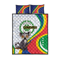 Comoros quilt and matching pillow set, featuring lemur artwork and multicolor flag pattern