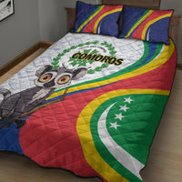 Comoros quilt bed set close-up with lemur, green emblem, and red yellow green flag colors
