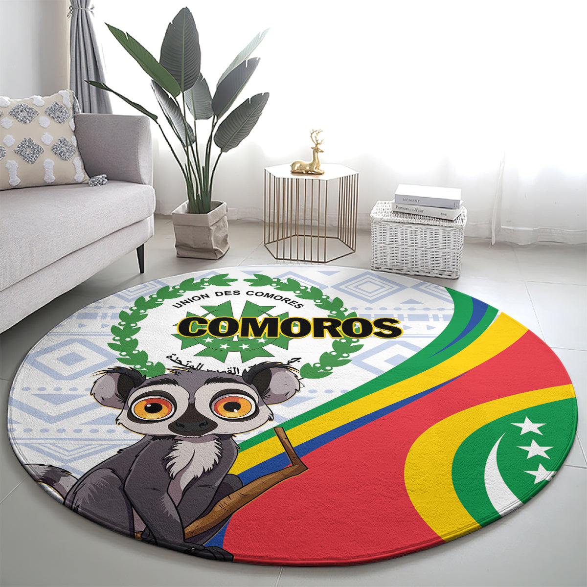 Round rug with cartoon lemur face, COMOROS text, rainbow flag stripes and blue border