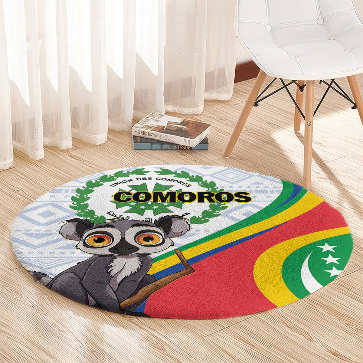 Round rug with cartoon lemur, COMOROS text, rainbow flag colors on blue geometric background