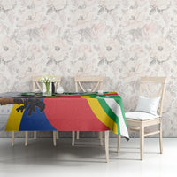 Comoros-themed tablecloth in red, green, and yellow stripes with animal scene