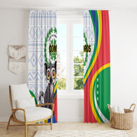 Full window curtain pair with lemur print, blue diamond pattern, and red-yellow-green arcs