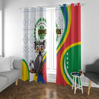 Window curtain set showing lemur character and Comoros rainbow arc design on multicolor panels