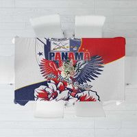 Red, blue, and white patterned tablecloth with Panama eagle and floral motif.