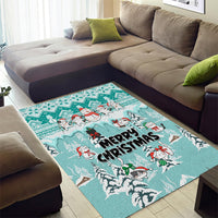 Turquoise Christmas area rug with 'Merry Christmas' and snowman/cat characters in winter