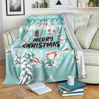 Turquoise Christmas cat blanket with snowman, cats, and “Merry Christmas”