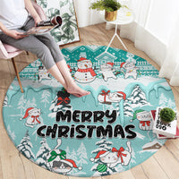 Turquoise round Christmas cat rug with snowman, winter cats, and 'Merry Christmas' text