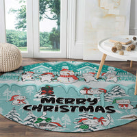 Turquoise round Christmas cat rug with cats, snowman, and 'Merry Christmas' center text
