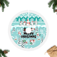 Turquoise round tree skirt with cat and snowman scene and Merry Christmas text