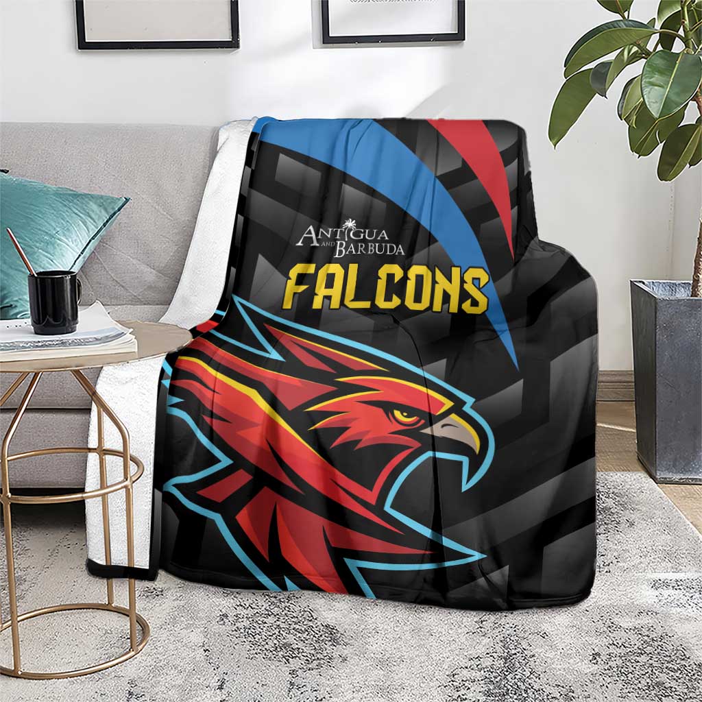 Black Falcons cricket blanket draped over a couch, showing eagle head and branding