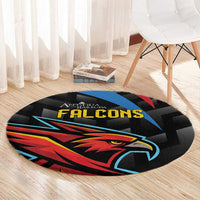 Black round carpet with centered Falcons eagle graphic in blue, red, and yellow