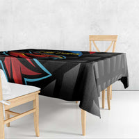 Black cricket tablecloth corner detail with bold Falcons design and hanging edge