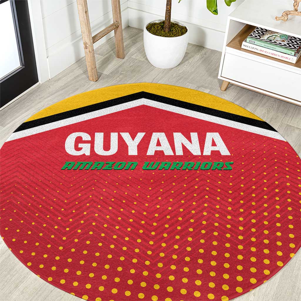 Red round cricket carpet with yellow and black border, Guyana Amazon Warriors text.