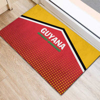 Guyana cricket rubber doormat, close-up red logo on dotted pattern with yellow edge