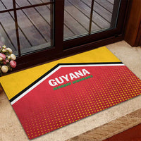 Guyana cricket rubber doormat in red with yellow border and team logo near door