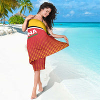 Yellow and red Guyana cricket sarong with black trim and large front logo