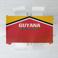 Red and yellow Guyana cricket tablecloth with dotted pattern and black border