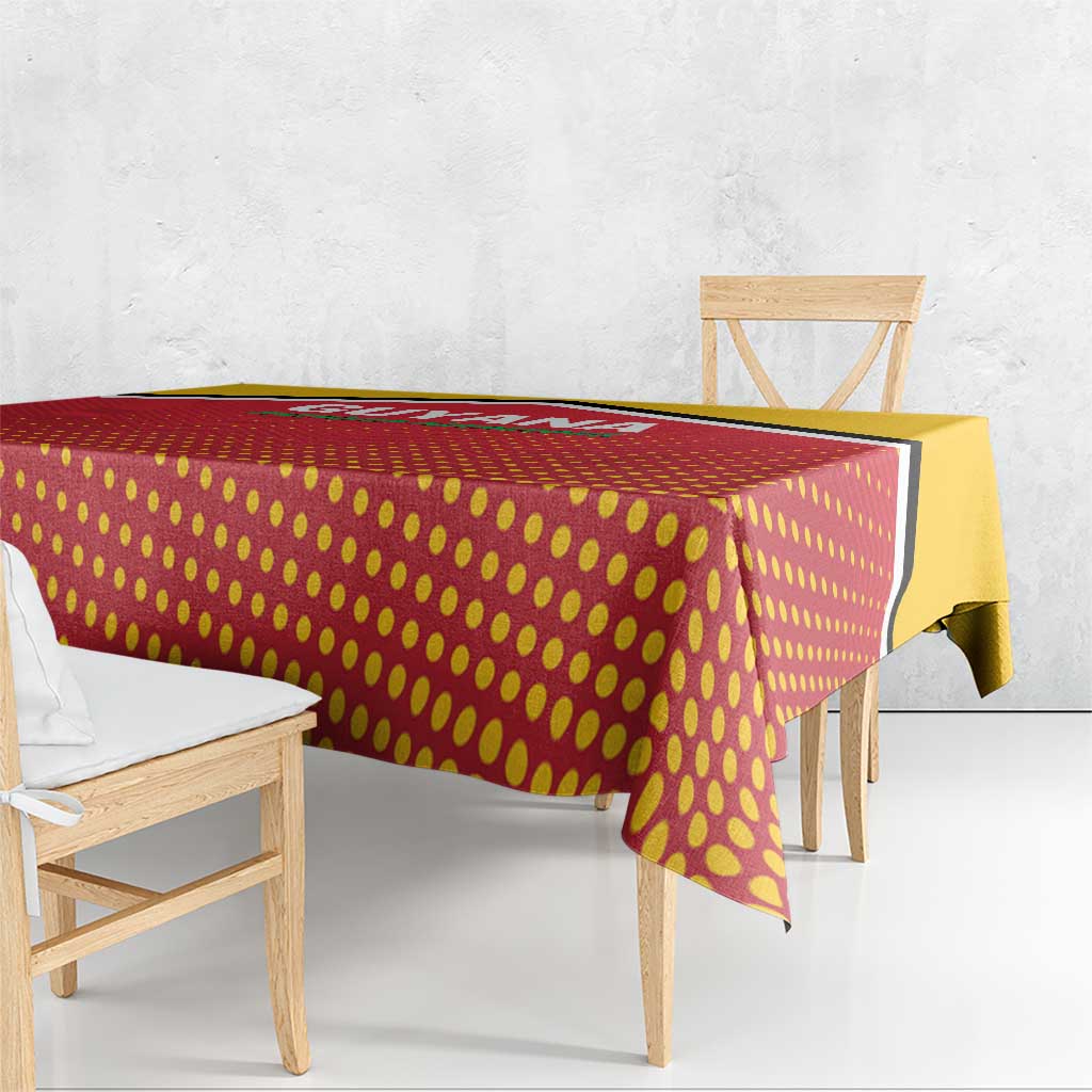 Red and yellow dotted cricket tablecloth with black trim, over bench table