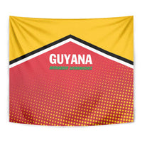 Cricket team tapestry closeup: GUYANA text, Amazon Warriors subtitle, yellow-red dotted chevrons