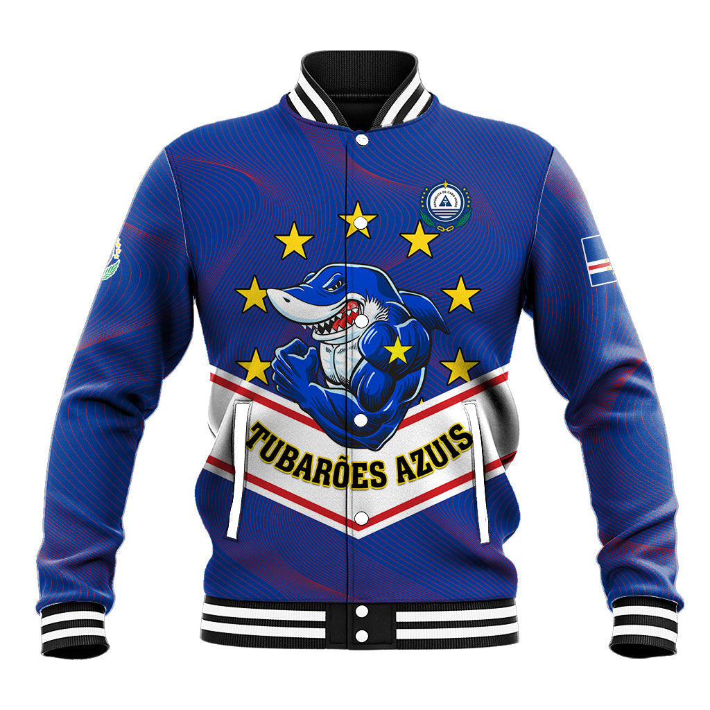 Blue baseball jacket with ribbed collar, striped cuffs, shark graphic, stars, snap buttons