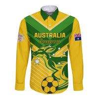 Yellow and green long-sleeve button shirt with V-pattern graphic and soccer ball