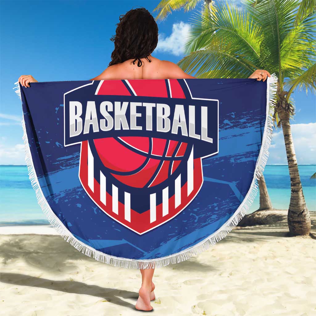 Blue round basketball beach blanket with fringe edge and bold basketball crest