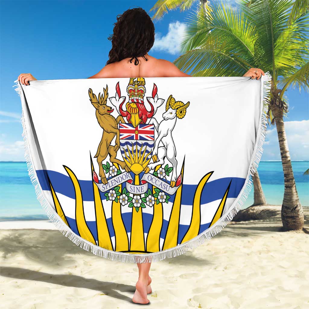 White round beach blanket with British Columbia crest, fringed trim, held up