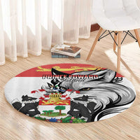 Red and gray illustrated round area rug with crest shield and lion face artwork