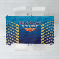 Blue cricket tablecloth with “Mumbai Cricket” logo and gold geometric pattern