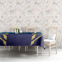 Blue and gold geometric cricket tablecloth on dining table with chairs