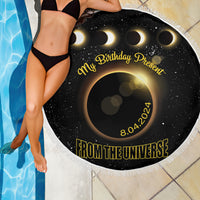 Black round beach blanket with white fringe, “My Birthday Present” and “8.04.2024” on eclipse art