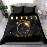 Black bedding set with starry eclipse print, gold “my Birthday Present” text on duvet