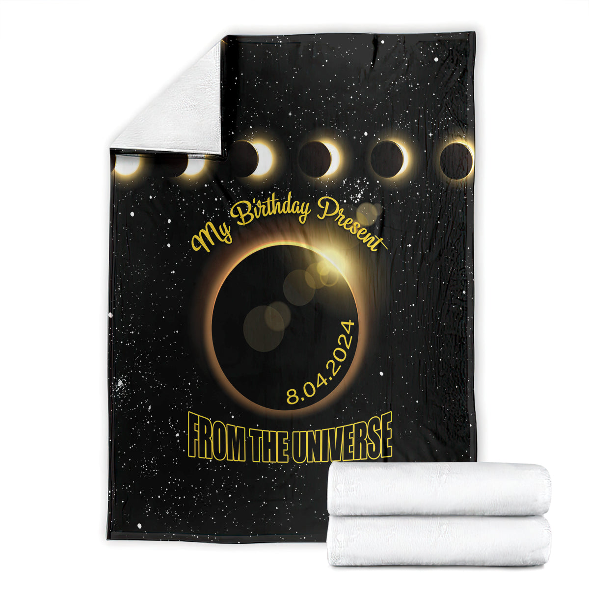 Black eclipse throw blanket with gold birthday message, ring shapes, and date print