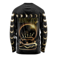 Black unisex long sleeve shirt with solar eclipse graphic, “YOUR TEXT” and crown design