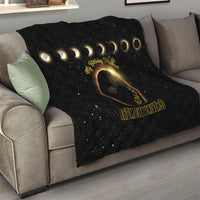Black quilt with quilted diamond texture, golden rings and 'From the Universe' text