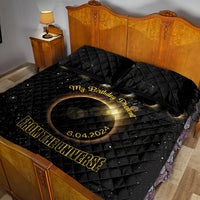 Black eclipse quilt bed set with gold 8.04.2024 and ring motif on the comforter